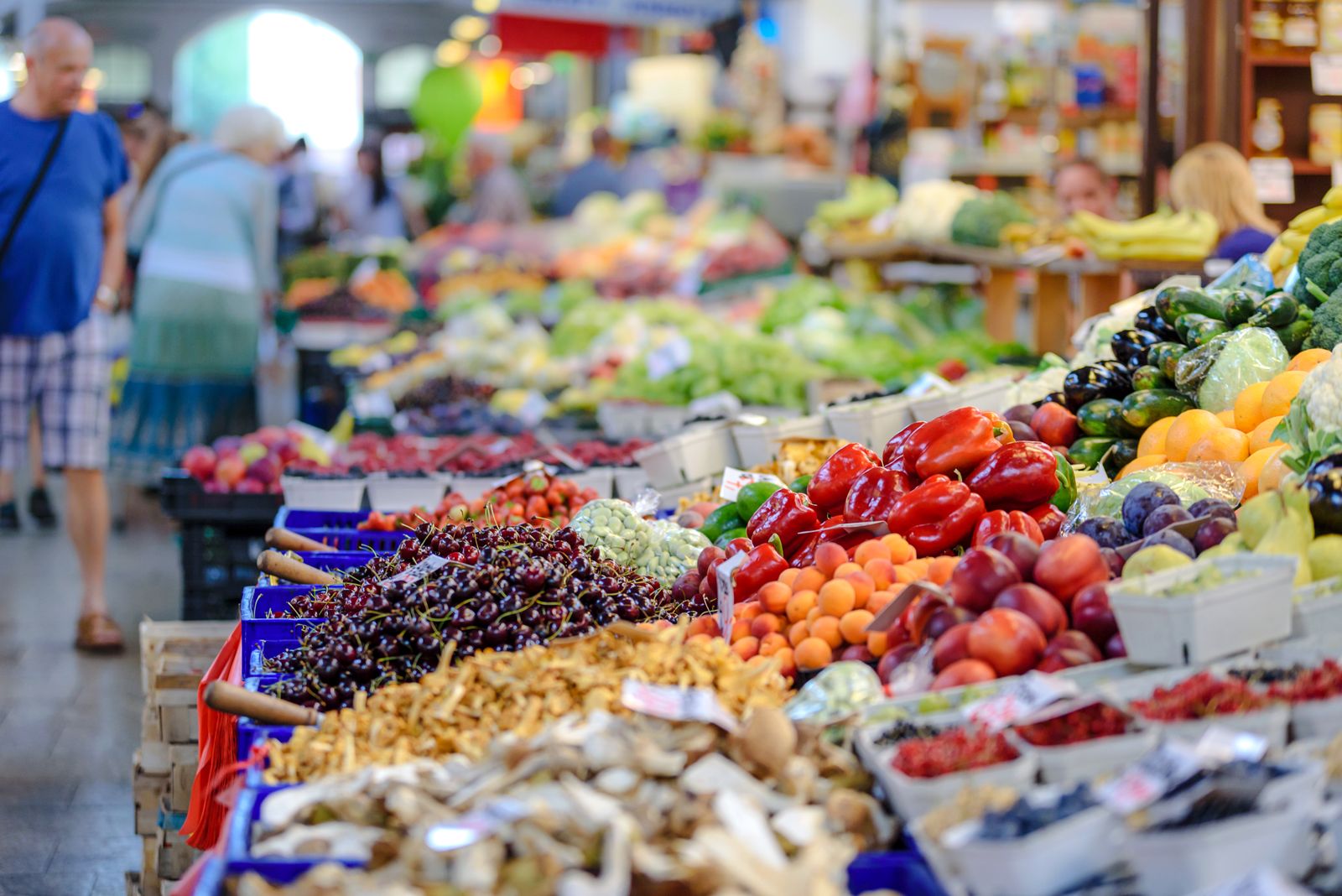 Fresh produce stall, piled high with fruit and vegetables